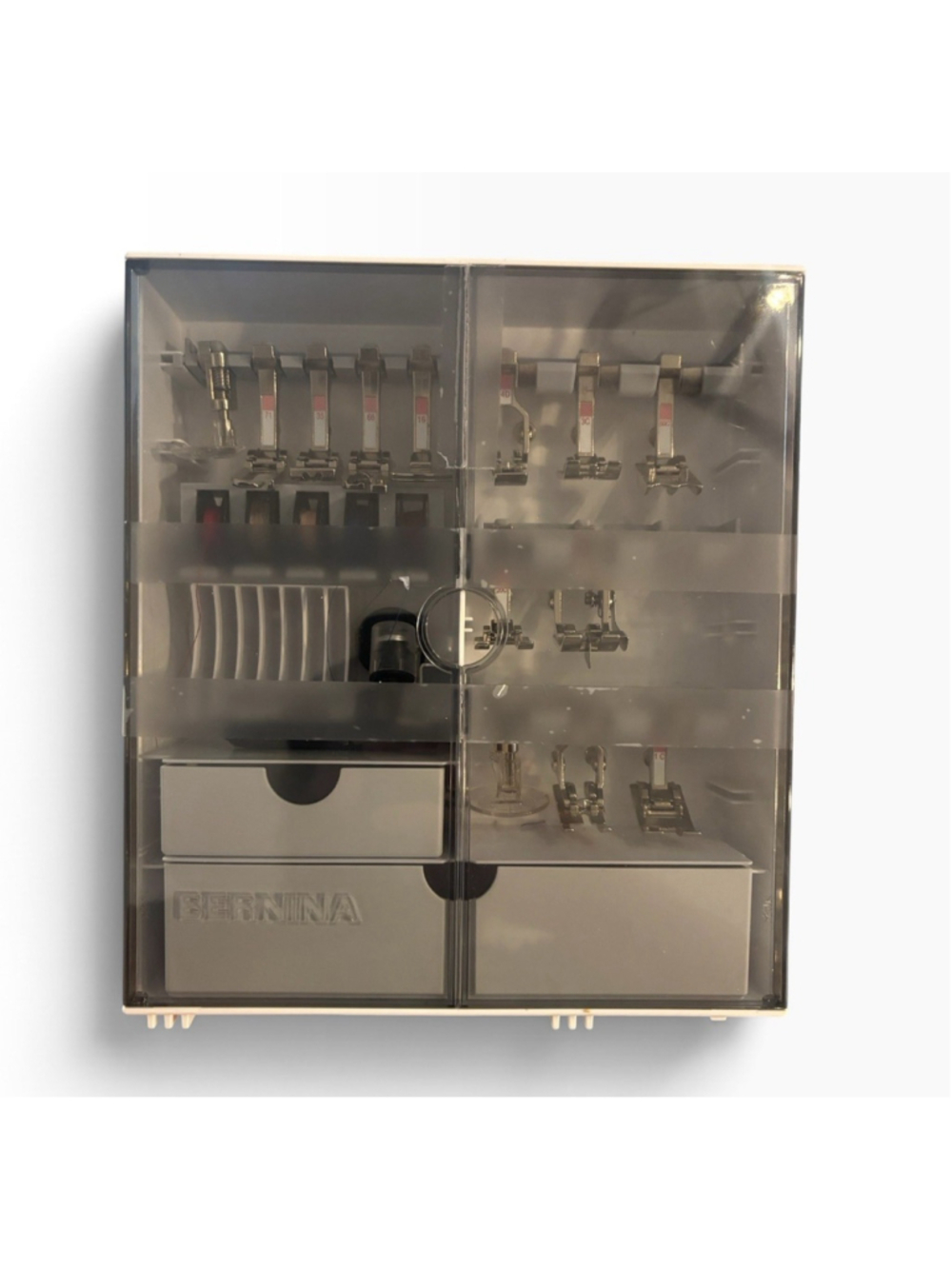 Bernina accessory storage case With presser feet.
